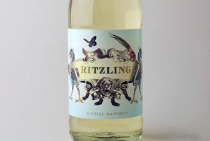 Ritzling mini-wine bottle featuring the banned slogan, 'bottled happiness'.Photo / Supplied