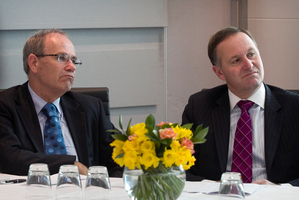 Nothing to smile about for either Len Brown (left) or John Key. Photo / Natalie Slade