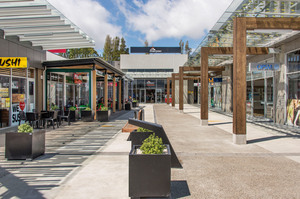 A street-level view of some of the 36 retail outlets within the Silverdale Centre, which is for sale. Photo / Supplied