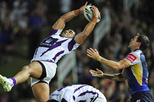 Mahe Fonua of the Storm catches a high ball over Ashley Graham. Photo / Getty Images
