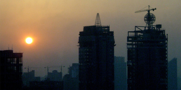 With China's massive economic growth have come pollution and longer working hours, says Christoph Schumacher. Photo / NZH
