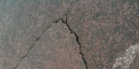 Driveway cracks after the earthquake in Unsworth Heights North Shore. Photo / Tamaryn Peddie