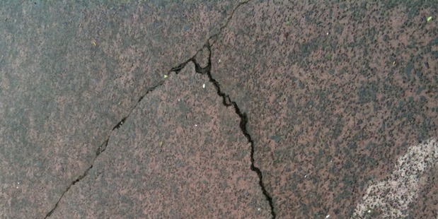 Driveway cracks after the earthquake in Unsworth Heights North Shore. Photo / Tamaryn Peddie