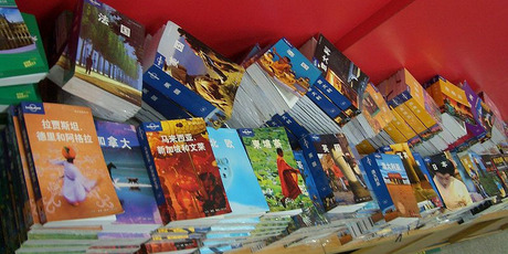 Lonely Planet books for sale in a Chinese bookshop. The backpacker 'Bible' is printed in multiple languages. Photo / WikiCommons