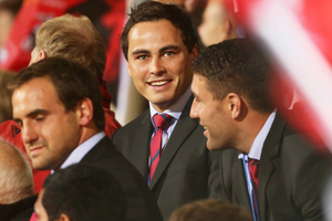 Zac Guildford sits with injured Crusaders players to watch their side face the Bulls. Photo / Getty Images