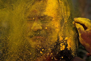 An Indian man celebrates the Holi festival in Gauhati, India. Photo / AP