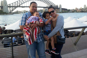 Fala Sakaria and his wife, Lafoaluga, with their children Lucas and Maryanne-Felesa, say the pay is good and living costs cheaper in Australia. Photo / Supplied