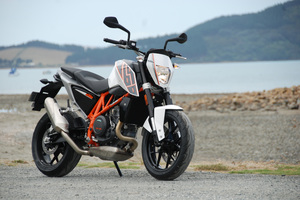 The 690 Duke's comfy dished seat and a delivery of 300km from its 14-litre tank mean you can hit the back roads more often. Pictures / Jacqui Madelin