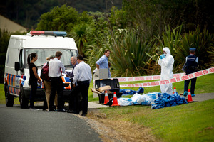Police at the scene where a woman's body was found at a house on Rodeo Drive, Redvale, Friday. 29 March 2013 New Zealand Herald Photograph by Dean Purcell. NZH 30Mar13 - Police at the lifestyle bl
