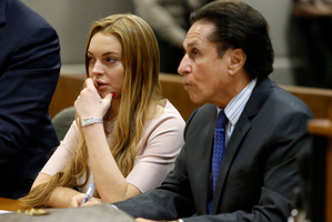 Actress Lindsay Lohan and her attorney Mark Heller listen during a hearing in Los Angeles Superior Court. Photo / AP