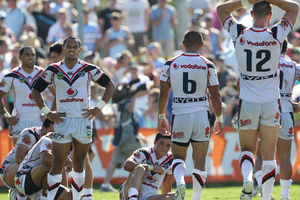 Dejected Warriors after another Sharks try during the round three NRL match between the Cronulla Sharks and the New Zealand Warriors. Photo / Getty Images.
