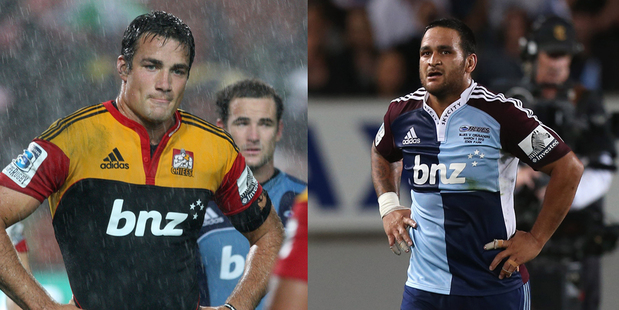 Richard Kahui of the Chiefs (left) will face off against All Blacks team mate Piri Weepu of the Blues tonight. Photo / Getty Images.