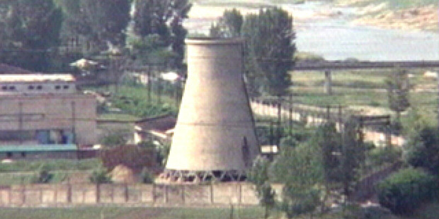The 60-foot-tall cooling tower is seen before its demolition at the main Nyongbyon reactor complex in Nyongbyon before its demolition in 2007. Photo / AP