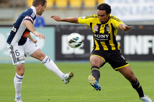 Paul Ifill of the Phoenix and Marcos Flores of the Victory compete for the ball during the round 27 A-League match between the Wellington Phoenix the Melbourne Victory. Photo / Getty Images.