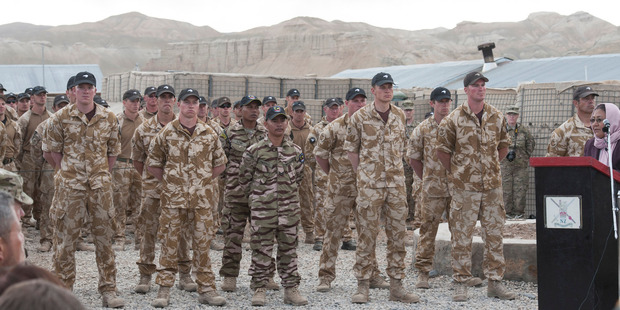 Provincial Governor Habiba Sarobi, at the podium, says Kiwi troops have changed the face of Bamiyan. Photo / NZ Defence Force