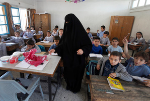 Palestinian children attend a class at the UNRWA elementary school in Shati refugee camp in Gaza City. Photo / AP