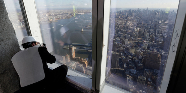 A view of the Manhattan skyline from the unfinished observation deck on the 100th floor of the One World Trade Center building. Photo / AP