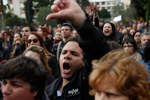 Cypriots face tough times as the country's economy turns down sharply because of the crisis. Photo / AP