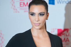 Kim Kardashian has been copping flak for her blossoming baby body.Photo / AP