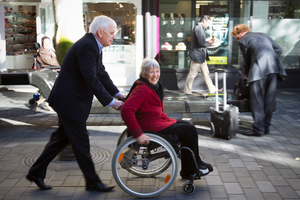 Auckland Council chief executive Doug McKay and Vivian Naylor from CCS Disability Action try out a disabled access way in Auckland's CBD. Photo / Greg Bowker