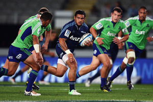 Piri Weepu of the Blues makes a break during the round eight Super Rugby match between the Blues and the Highlanders. Photo / Getty Images.