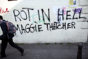 Maggie Thatcher's wish for faith, hope and love were lost on some people who vented their feelings about her policies after she died. Photo / AP