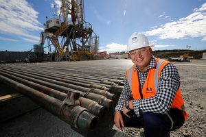 Hoani Murray with a new 5-inch (12.7cm) drill pipe, ready to begin drilling at Todd's Mangahewa oil and gas field. Photo / Supplied