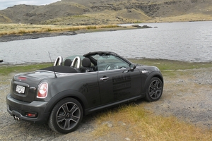 The Mini Roadster stops at Butchers Gully Lake, near Alexandra, in Otago, during the Pork Pie charity ride, over Easter 2013. Picture / Paul Charman