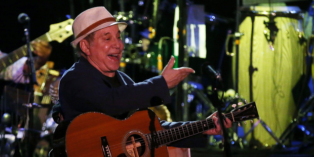 Paul Simon in concert. Photo/Getty Images
