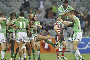 Raiders players celebrate after winning the round five NRL match against the Sydney Roosters. Photo / Getty Images