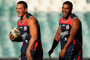 Sonny Bill Williams and teammate Michael Jennings share a laugh during a Sydney Roosters NRL training session. Photo /Getty Images