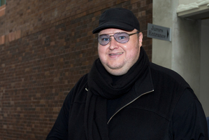 Kim Dotcom leaves the High Court at Auckland. Photo / Brett Phibbs