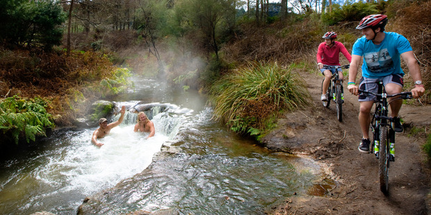 Cycling the new Te Ara Ahi cycle trail, part of the Nga Haerenga National Cycle Trail at Kerosene Creek, Rotorua. Photo / Supplied