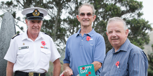 Mick O'Carroll, Jonny Walker and Fred Wilson with ANZAC day Poppies at the Navy Museum in Devonport. Photo / Greg Bowker