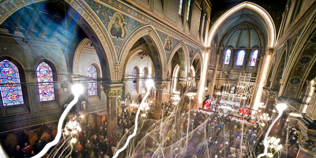 Romanian Catholic worshipers attend a religious service at the St. Joseph cathedral in Bucharest, Romania. Photo / AP