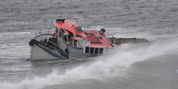 The Lady Anna had drifted about 25 metres up the Grey River. Photo / Greymouth Star