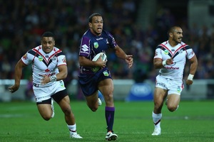 Will Chambers of the Storm breaks away to score Melbourne's opening try. Photo / Getty Images