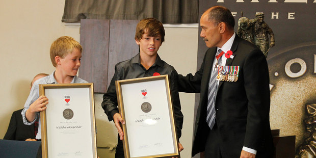 Will White and Sergio Schuler receive the RSA ANZAC of the Year award from His Excellency Lieutenant General The Right Honourable Sir Jerry Mataparae in Waihi. Photo / Christine Cornege