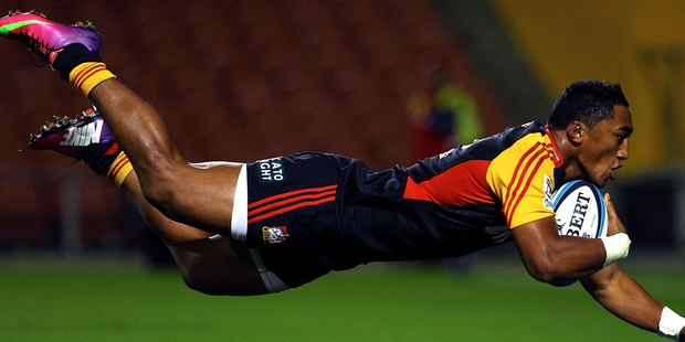 Chiefs' Bundee Aki dives for the try during the round 11 Super Rugby match between the Chiefs and the Sharks. Photo / Getty Images.