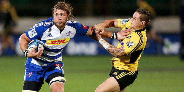 Duane Vermeulen of the Stormers fends TJ Perenara of the Hurricanes during the round 11 Super Rugby match between the Hurricanes and the Stormers. Photo / Getty Images,