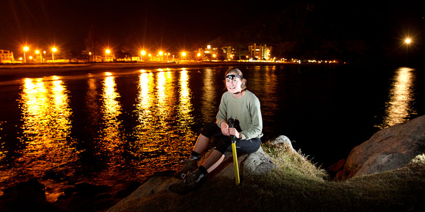Karin Sievwright patrols the edge of Moturiki Island at night checking to see that the lives of little blue penguins are getting back to normal. Photo / Alan Gibson