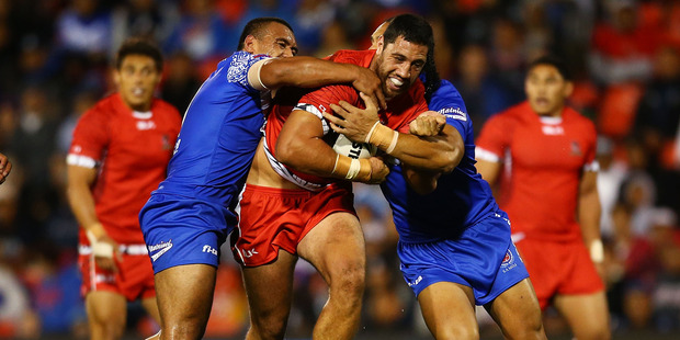 Tonga's Brent Kite rumbles up the park. Photo / Getty Images