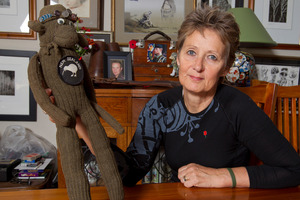 Maryanne O'Donnell with her son Lieutenant Tim O'Donnell's mascot, Rua Kiwi. Photo / Mark Mitchell