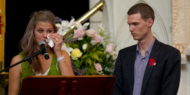 Dave McArtney's children Moana (left) and Gabriel pay tribute to their father at his funeral yesterday. Photo / Sarah Ivey