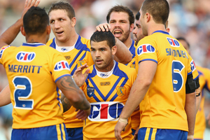Adam Reynolds of City is congratulated by his team mates after a forty-twenty kick during the Origin match between City and Country. Photo / Getty Images