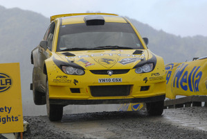 Last year's winner Chris tkins in action at the 2012 International Rally of Whangarei in a Proton. Photo / Euan Cameron