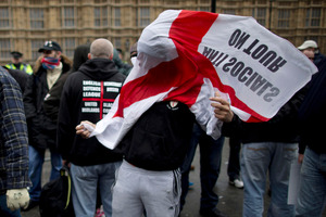 English Defence League members during a protest at the Houses of Parliament in London. Photo / AP