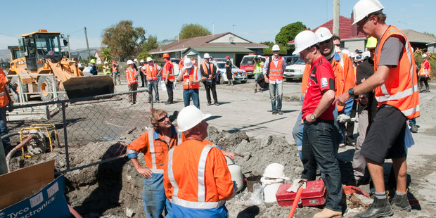 Prime Minister John Key, on a briefing and tour of damage to a damaged substation and power cables in Bexley, following the second Christchurch earthquake. File photo / NZPA