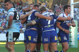 Bulldogs players celebrate a try during the round seven NRL match between the Sharks and the Bulldogs. Photo /Getty Images