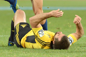 Conrad Smith lies prone after making a poor tackle. Photo / Getty Images